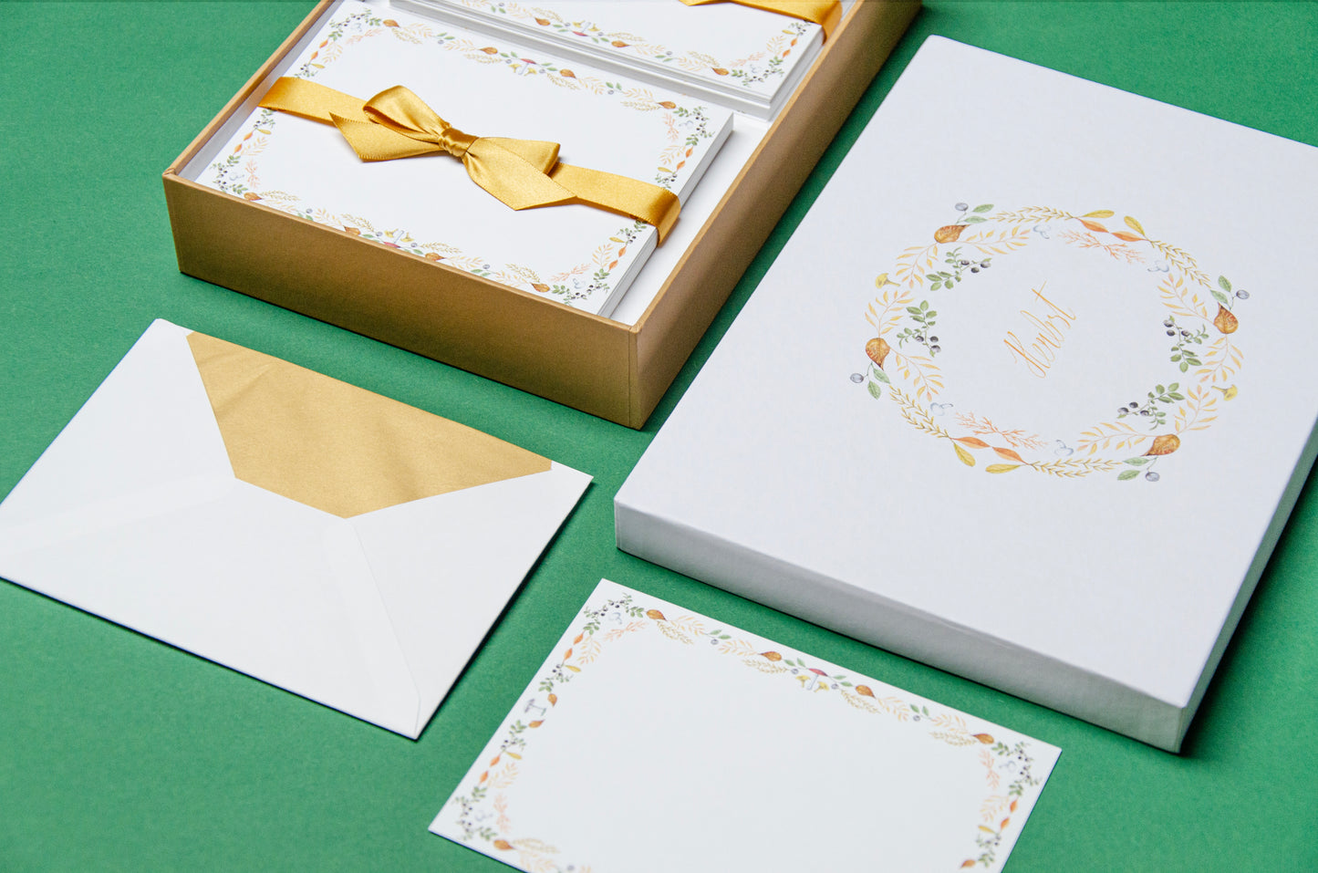 Autumn-themed letter paper box from the 'Four Seasons' set, featuring 50 cards and 50 colourfully lined envelopes adorned with illustrations of flowers and plants in a charming pattern 04