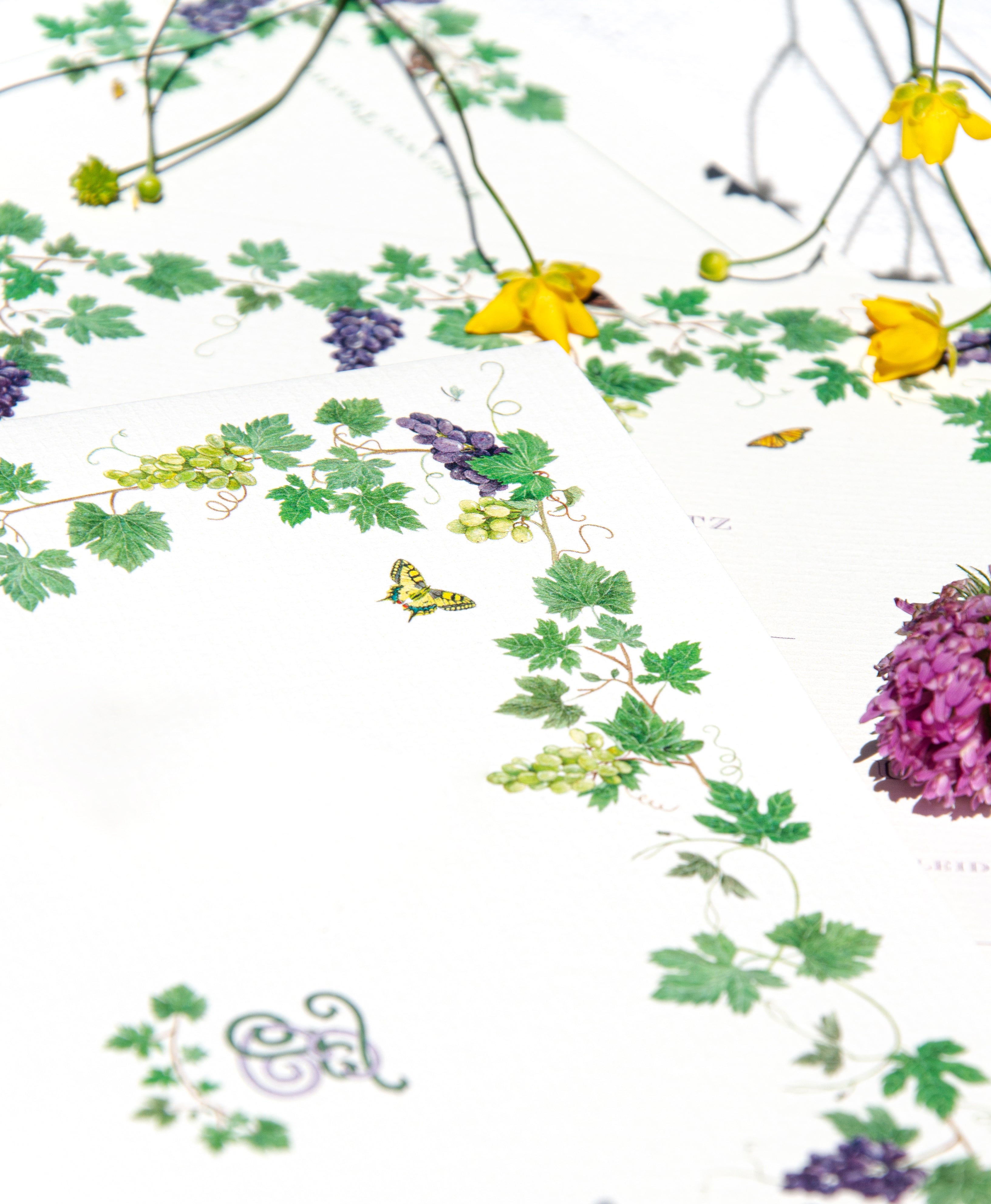 Personalised wedding invitations and stationery featuring delicate watercolour flowers, deers, a dreamy monogram, winery and butterflies - closeup