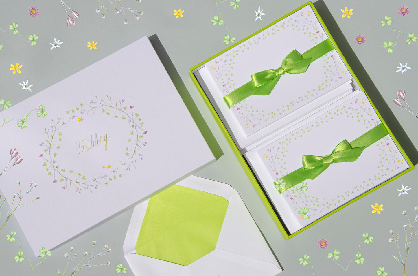 Spring-themed letter paper box from the 'Four Seasons' set, featuring 50 cards and 50 colourfully lined envelopes adorned with illustrations of flowers and plants in a charming pattern 01