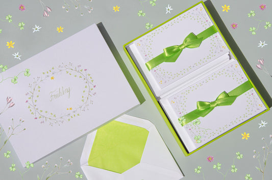 Spring-themed letter paper box from the 'Four Seasons' set, featuring 50 cards and 50 colourfully lined envelopes adorned with illustrations of flowers and plants in a charming pattern 01