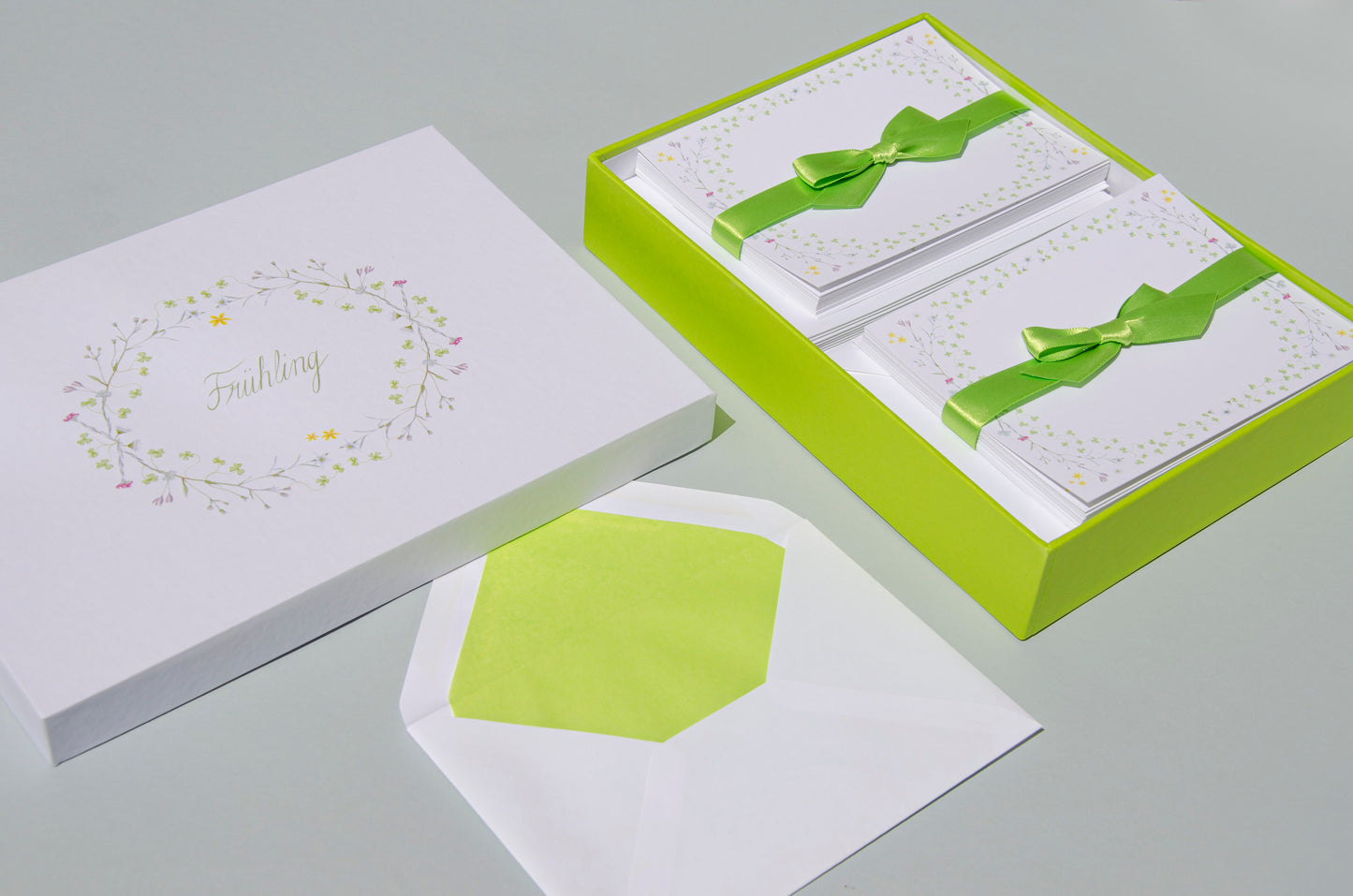 Spring-themed letter paper box from the 'Four Seasons' set, featuring 50 cards and 50 colourfully lined envelopes adorned with illustrations of flowers and plants in a charming pattern 02