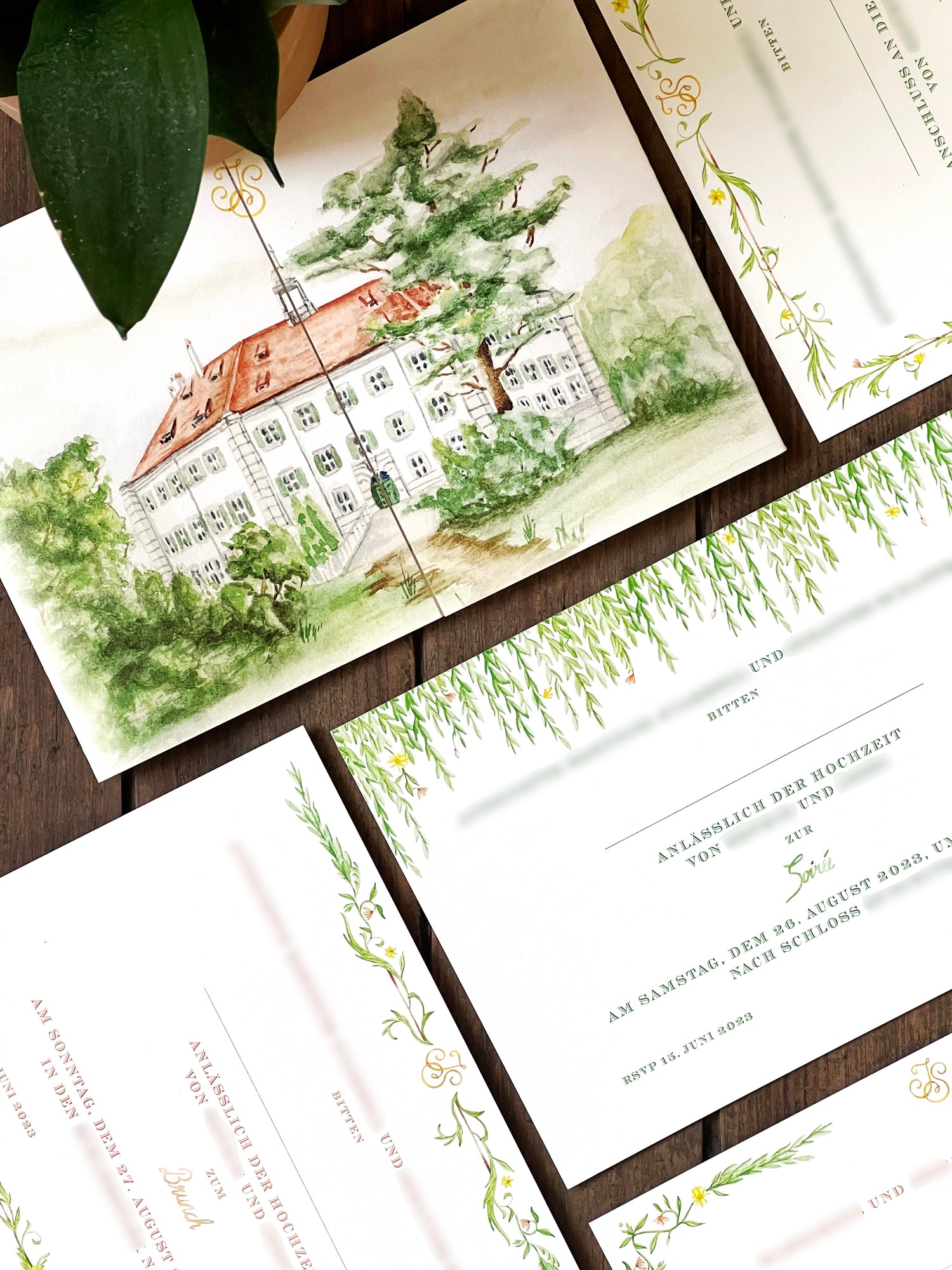 Personalised wedding invitations and stationery featuring delicate watercolour flowers, leaves and the castle of Sünching in Bavaria, Germany