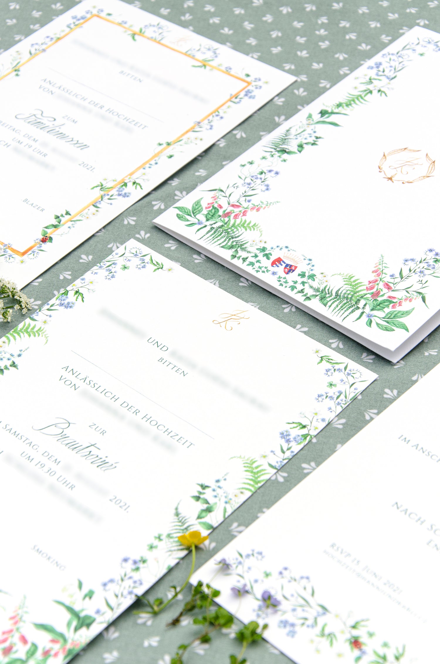 Personalised wedding invitations and stationery featuring delicate watercolour forget-me-not and other spring flowers, for a dream wedding in spring or summer